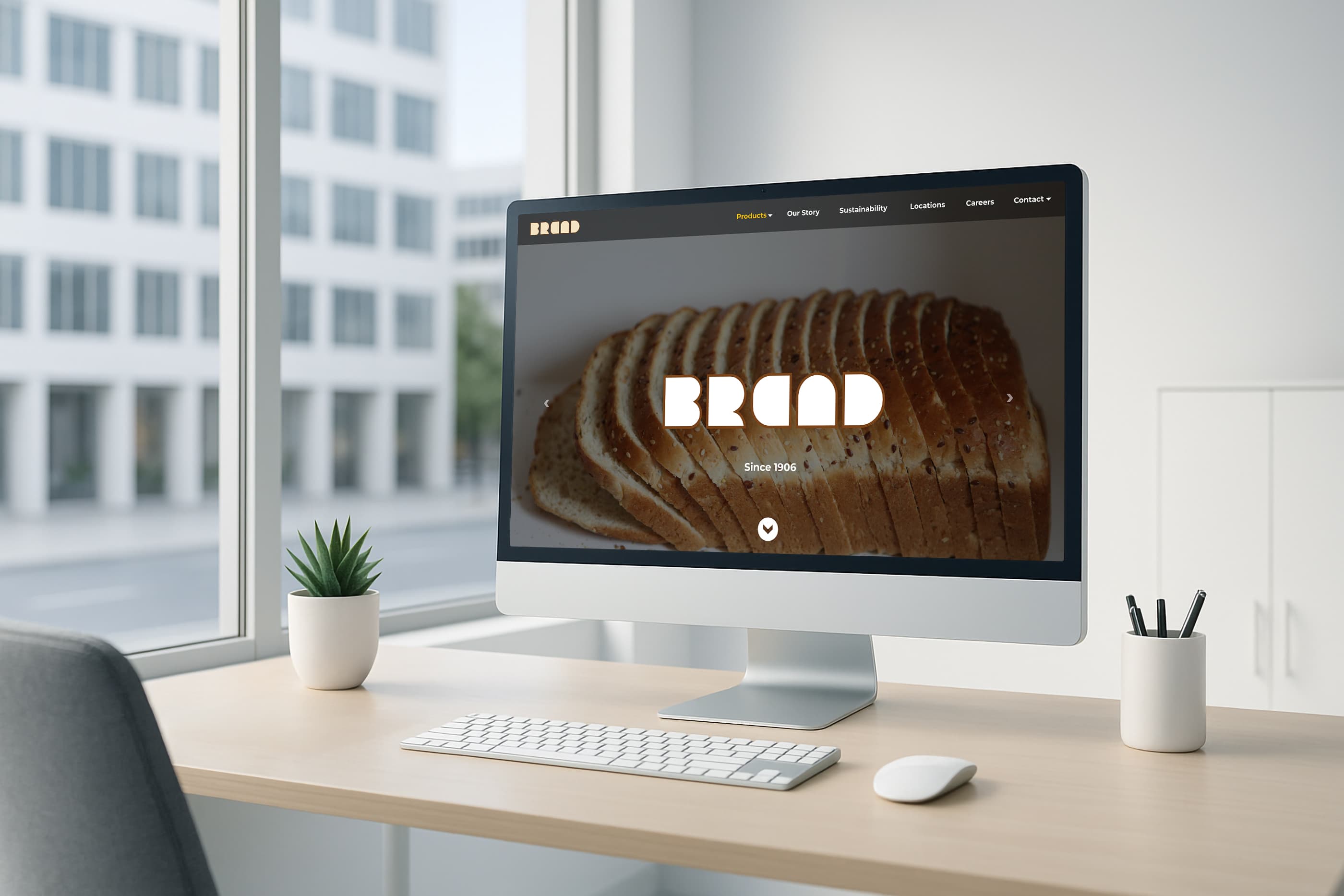 Website displayed on a desktop monitor in an office setting